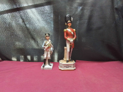 2 large, and medium sized military models of a French officer and grenadier guard 
H31cm. W7cm.
H21cm.  W7cm.
