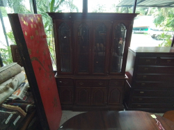 A 4 door break front bookcase in mahogany. L.151 cm H.203 cm, D.44 cm