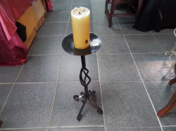 A Wrought Iron Candle stand 
H62cm.
W9.8cm.