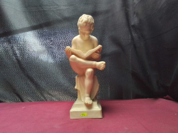 A Small Fibre stone of a boy Reading D13cm. W11cm. H37cm.