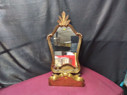 A Lovely Gilt mirror with shelf
H70cm. W37cm. 
