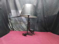 A Nice rustic table Lamp Pistol design with Shade 
H54cm.
