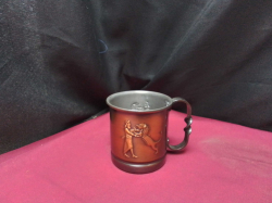  copper finished mug with a embossed mythological scene
