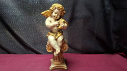A Cherub Playing Harp Angel with Wing figures 
H31cm. W9cm.