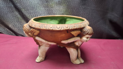 Ceramic Planter bowlembossed cherub Figures 
H14cm. W20cm.