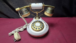 A Porcelain French decorator cradle phone
H19cm. W16cm.