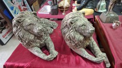 A Pair of plaster reclining Lion sculpture
L53cm. H31.5cm. W22cm.