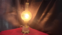 A replica glass oil lamp with Handle 
H37cm.