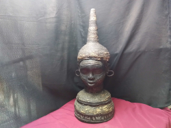 A Large African Antique head 
H67cm. W28cm.