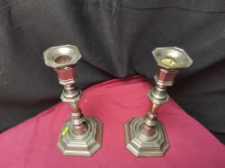 A Pair of Plated candle sticks 
H24cm. W10cm.