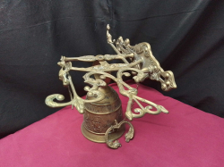 A Large Brass hanging bell 
H27cm. W28cm. L20cm.