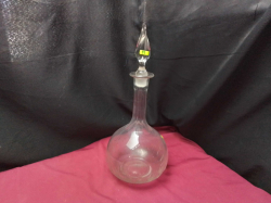 A old glass Decanter with a pointed Stopper 
H40cm.W15cm.