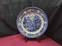 A Lovely Delft plate on a stand 
W34cm. L34cm.