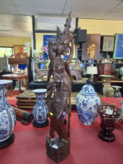 A hand carved ebony figure of a dancing lady 
H78cm. W13.3CM.