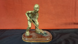 Vintage Brass Miner Figurine on wooden stand. Approx.16x17 cm