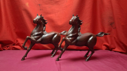 pair of  vintage  Chinese cast iron horses ( the year of the horse) 25 cm hight and 35 cm lenght