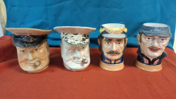 A box of various large character jugs including rare oversized Winston Churchill and musical European soldiers 