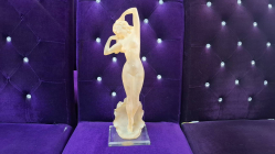 A vintage Monique Sculptures art deco style lucite figure of a female on stand 49cm high