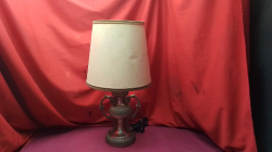 A Metal Table Lamp with a shade. 
H56cm.
W13cm.