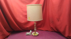 An onyx table Lamp with Shade.
H55cm. 
W10cm.