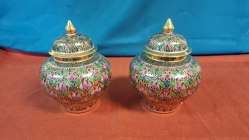 A Beautiful pair of traditional Benjarong covered Jars in mint condition hand painted 24k gold 6.6 inches high. 