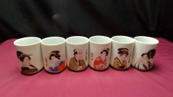 Six japaneae ceramic tumblers all illustrated with Geishas and each one signed