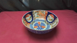 An antique 19th century Japanese imari porcelain bowl with floral landscape pattern 9.75''dia 4'' high stamped to base in perfect condition no crack etc.