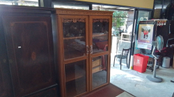 A Tall 2 door 3 shelf 2 drawer glazed wooden Bookcase 
16x56.5x190cm.