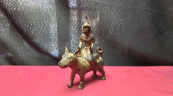 A Bronze Thai Figure Riding a wolf 