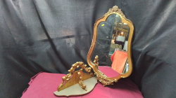 A Nice Gilt mirror with a base.
H66 W14cm.