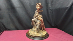 A. Lovely Large ceramic figure of an old man and his dog on a wooden plate.
H43 W30cm. 