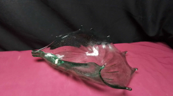 A Green glass folded fruit dish.
17x27cm.
