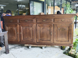 A Large high French Oak Side Board with 4 top drawers and 4 bottom cupboard. 
270x117x53cm.