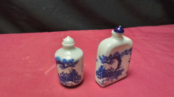  two chinese blue and white perfume/snuff bottles both with 4 character marks to base both have original stoppers one shows gusyuzi decending the mountains

