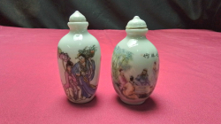 two famille rose perfume/snuff bottles both with original stoppers 
One shows a traditional chinese folk story
The other shows the seven sages if chinese 3rd century scholars

