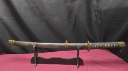 Vintage samurai swords on stand stamped 