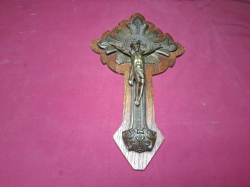 A Bronze Crucifix of a Wooden Background. 
W23cmx40cm