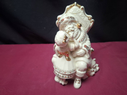 A Ceramic Santa millennium edition. 
H17xW11cm.